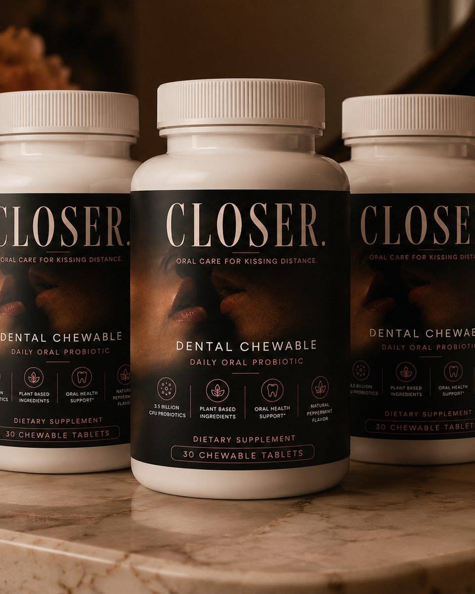 Three bottles of CLOSER. The Daily Oral by candlelight